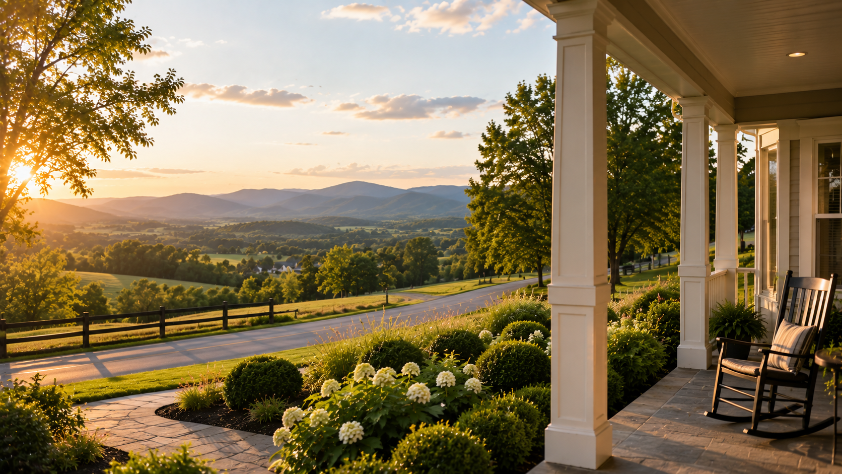 A front porch overlooking the Shenandoah Valley at golden hour, with a rocking chair and hydrangeas.